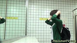 Japanese babe squatting to urinate